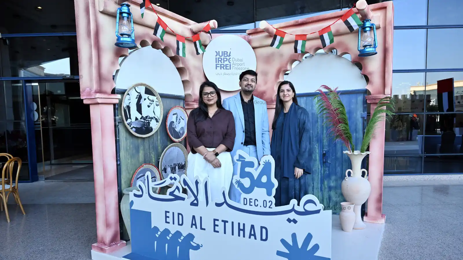 Guests posing at a UAE National Day themed photo activation during the Dubai Airport Freezone celebration event in Dubai