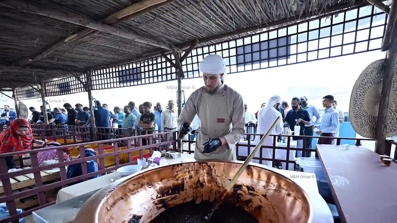 Live Omani halwa making station during the Dubai Airport Freezone UAE National Day celebration in Dubai