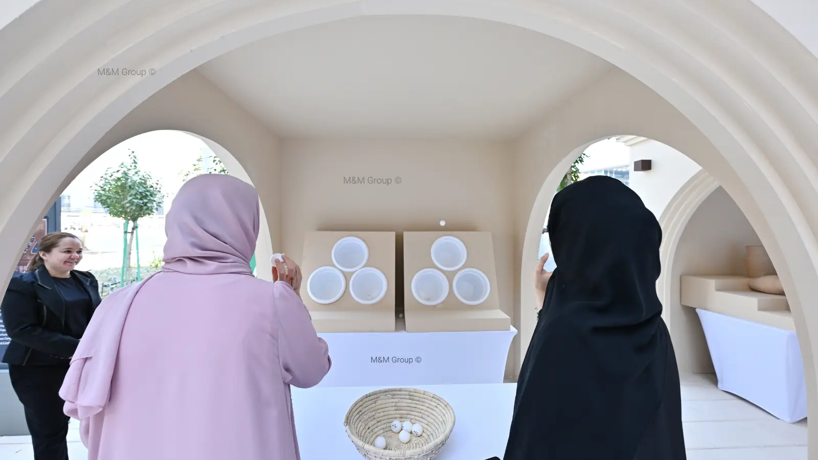 Visitors participating in traditional Emirati games activities during the Dubai Airport Freezone UAE National Day celebration event