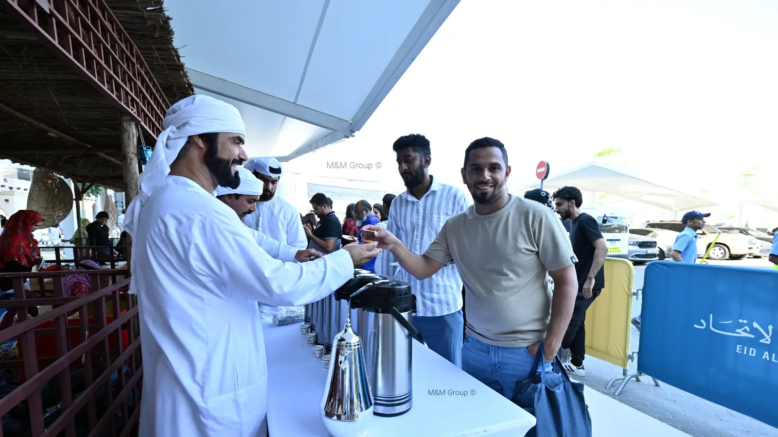 Traditional Emirati kahwa station serving Arabic coffee to guests during the Dubai Airport Freezone UAE National Day celebration event
